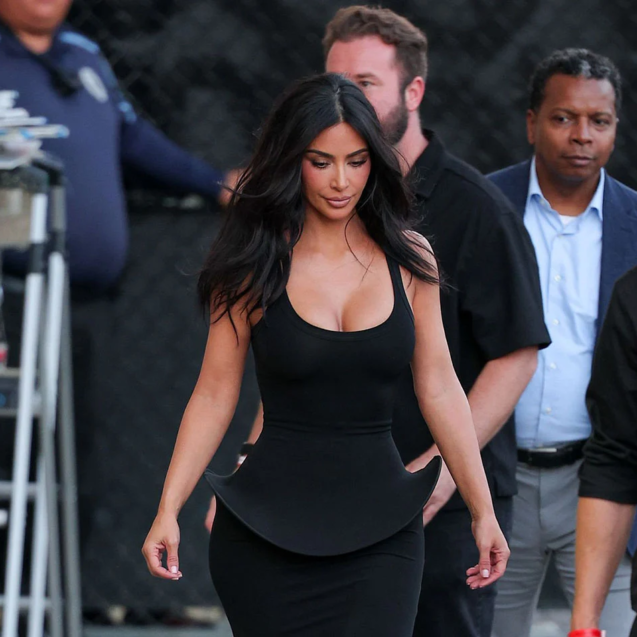 kim-kardashian-sportmax-sculptural-peplum-side-view-2026